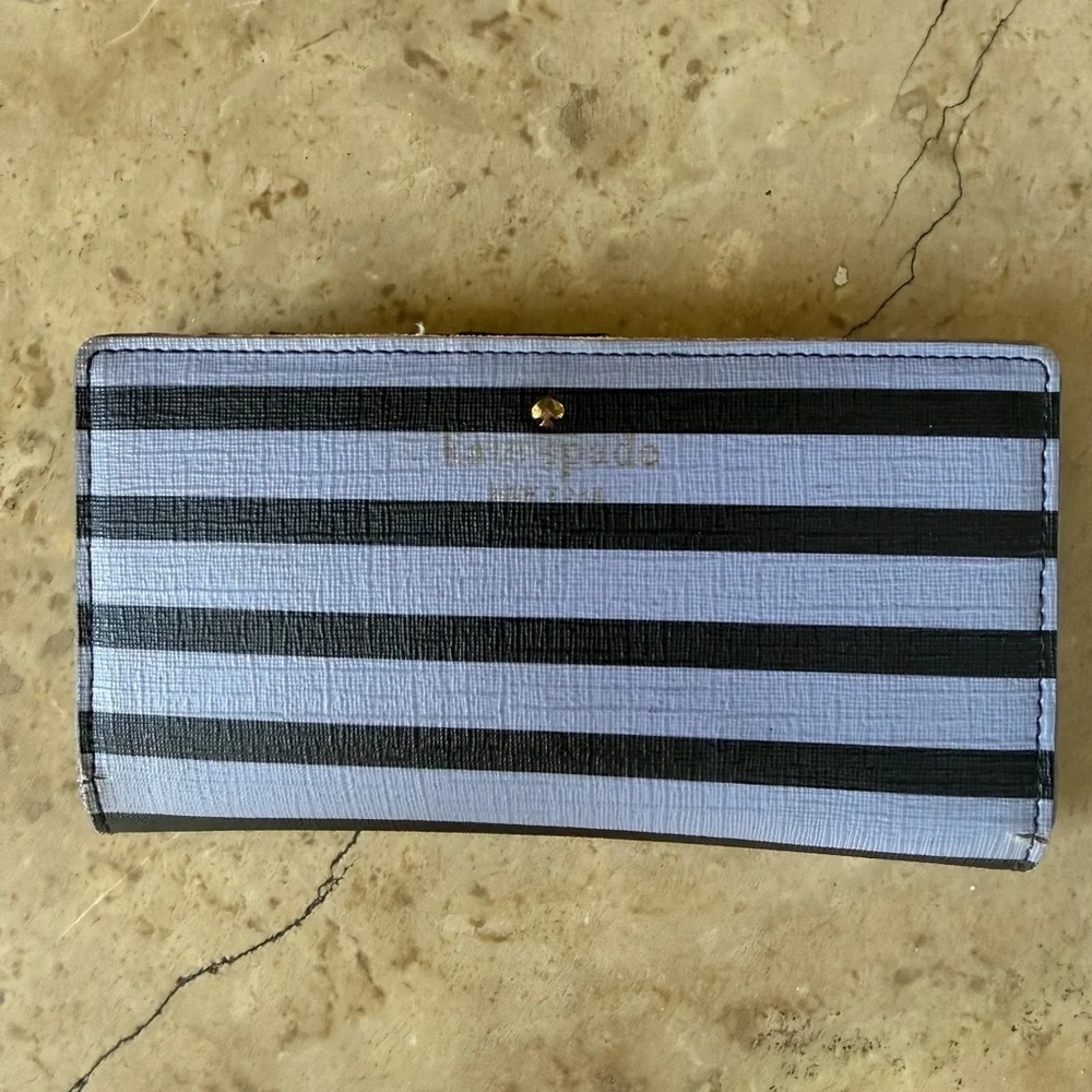 KATE SPADE ladies wallet 3 1/2 x 7” preowned good fair condition, purple black